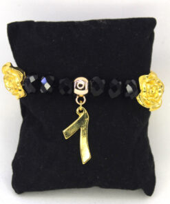 Pulseira de Exu Sete Caveiras Preto e Dourado