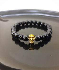 Pulseira de Pérola Negra com Caveira Dourada