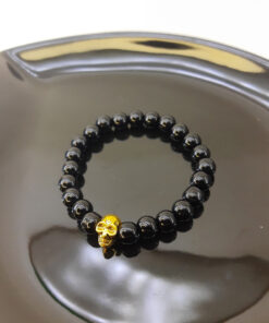 Pulseira de Pérola Negra com Caveira Dourada